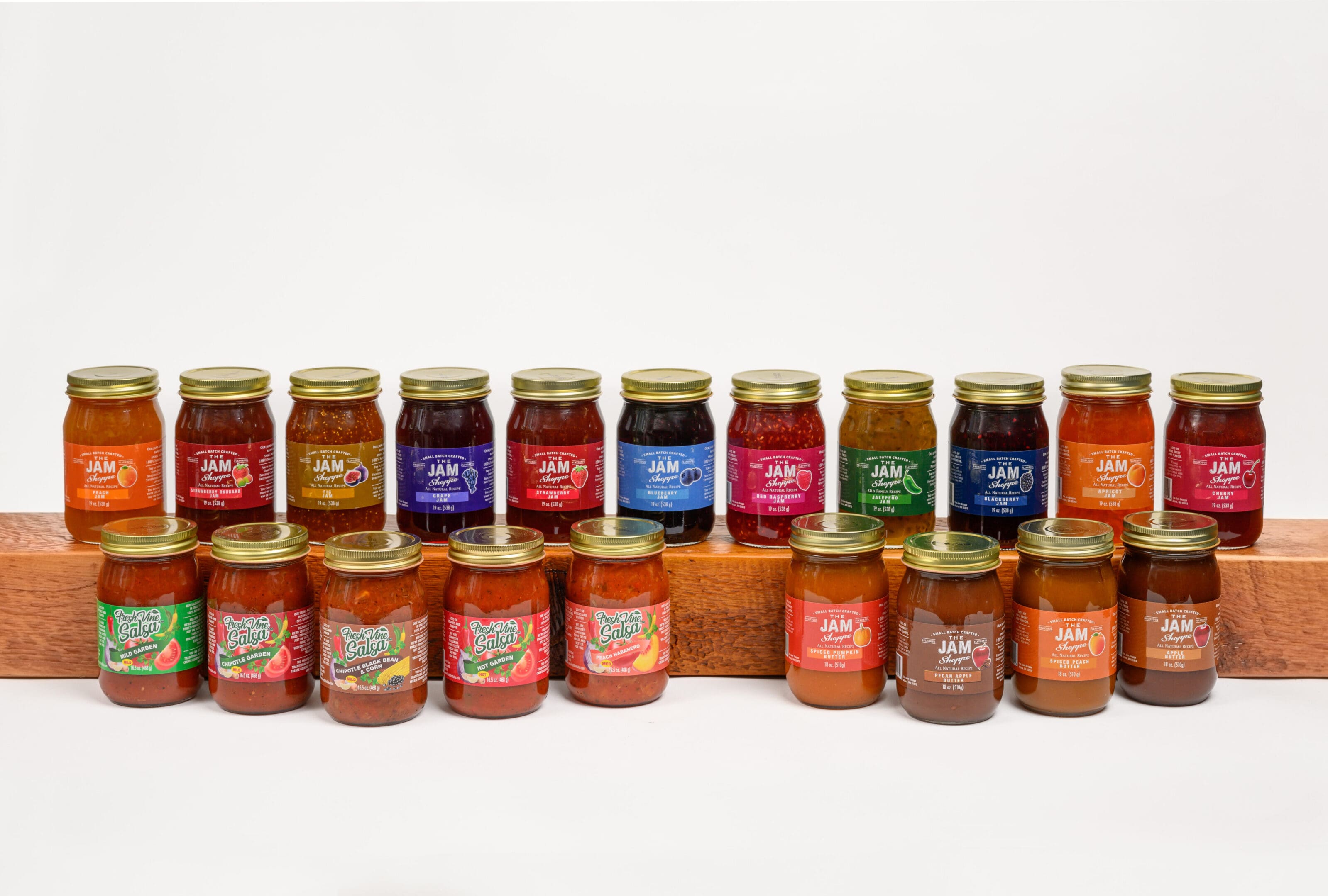 A row of jars filled with different types of food.