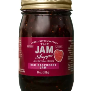 A jar of red raspberry jam.