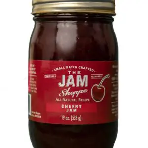 A jar of cherry jam is shown.