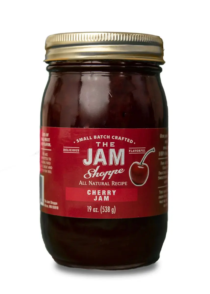 A jar of cherry jam is shown.