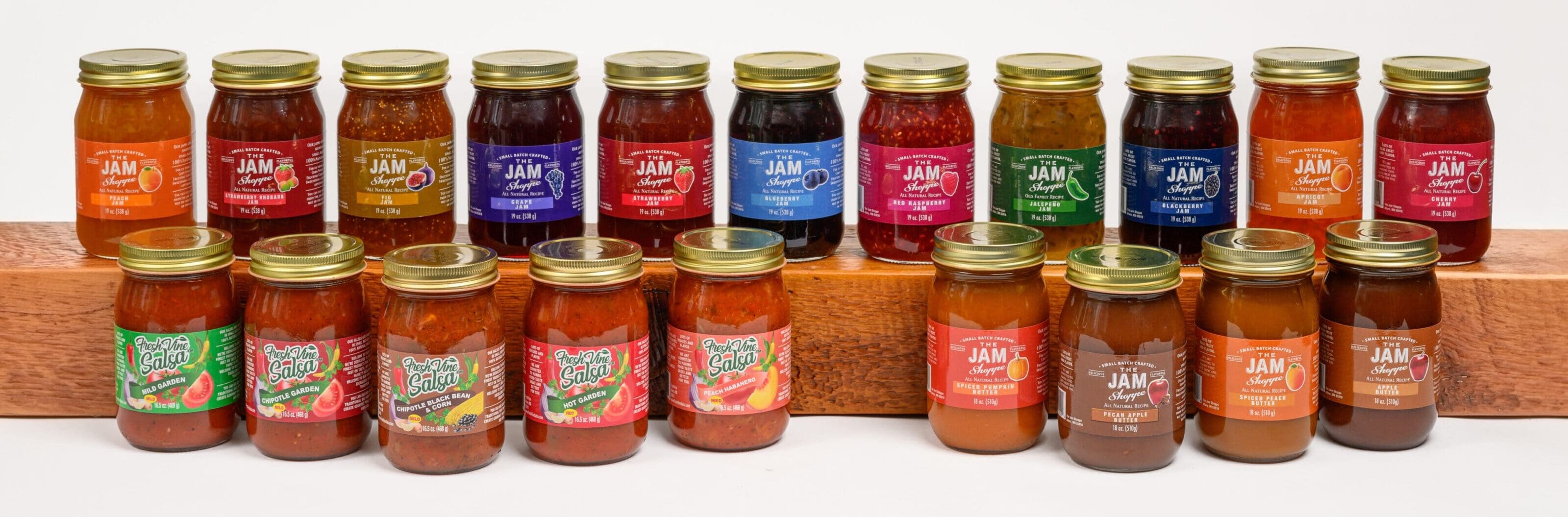 A group of jars with different flavors on them.